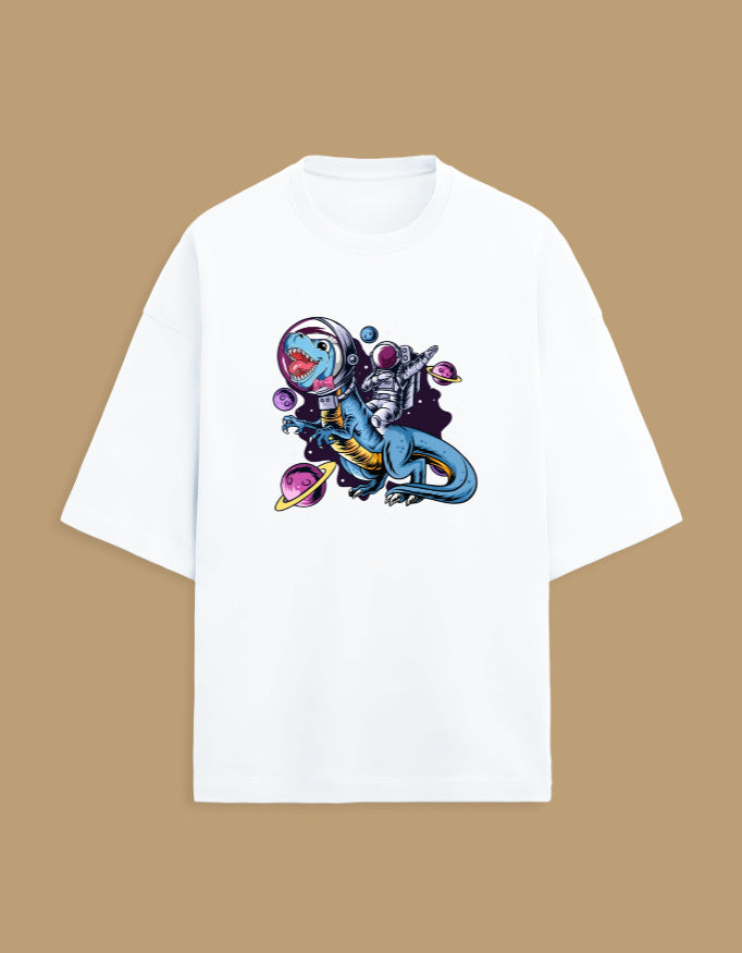 White T-shirt with astronaut riding dinosaur graphic, planets and space design on beige background