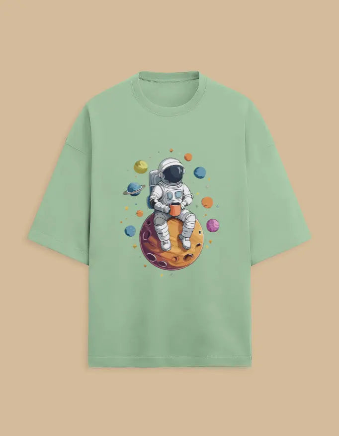 Mint green astronaut graphic T-shirt on a hanger – Men’s premium tees by ItiDharma”