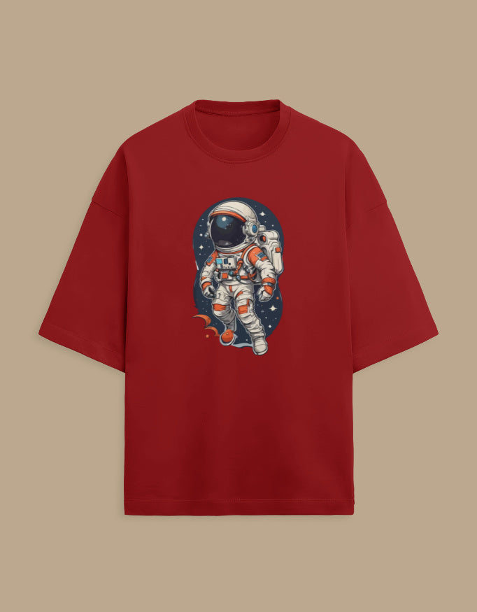 Red T-shirt with astronaut graphic and space background, space-themed apparel