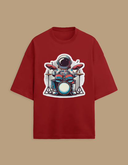 Red t-shirt with cartoon astronaut playing drums graphic, casual space-themed apparel