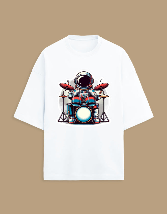 White t-shirt with cartoon astronaut playing drums, music themed graphic apparel