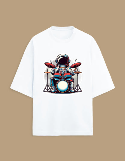 White t-shirt with cartoon astronaut playing drums, music themed graphic apparel