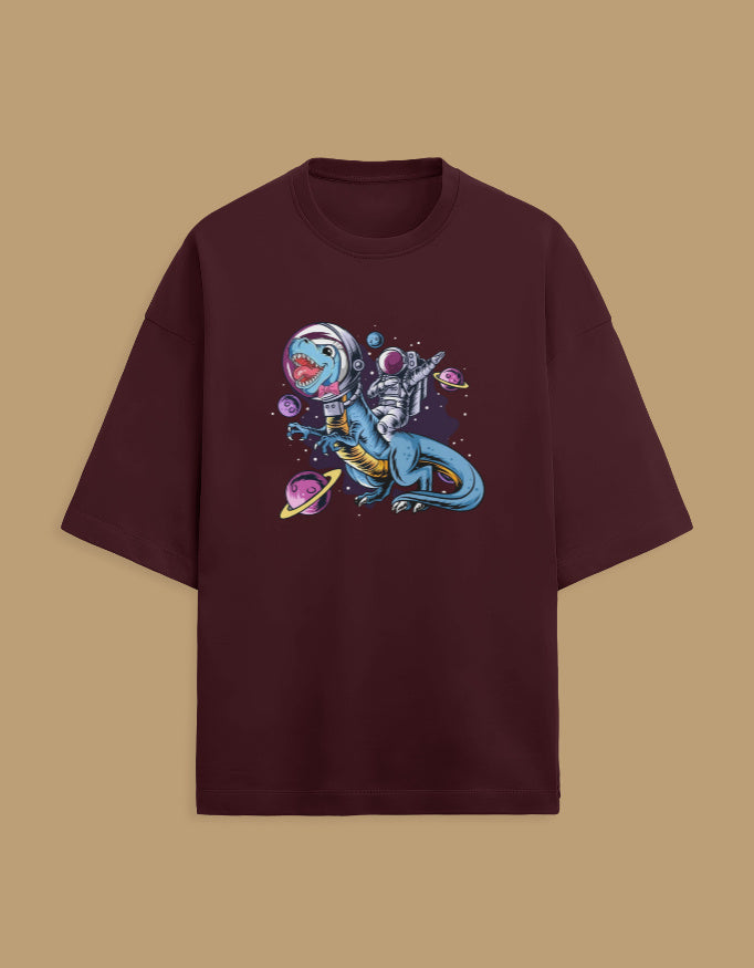 Maroon t-shirt with astronaut riding dinosaur in outer space graphic, planets background