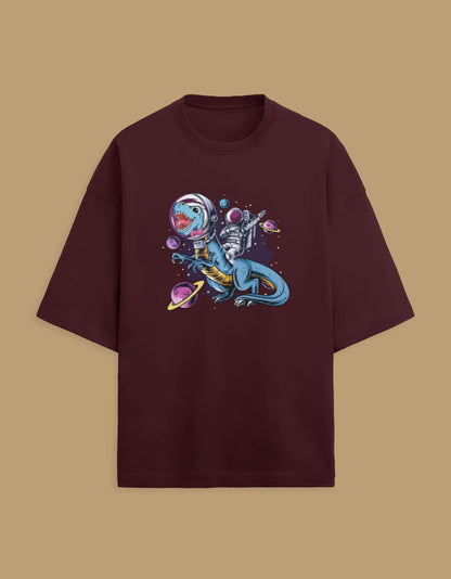 Maroon t-shirt with astronaut riding dinosaur in outer space graphic, planets background