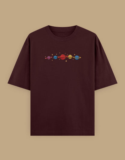 Maroon oversized t-shirt with colorful planets embroidery on the chest