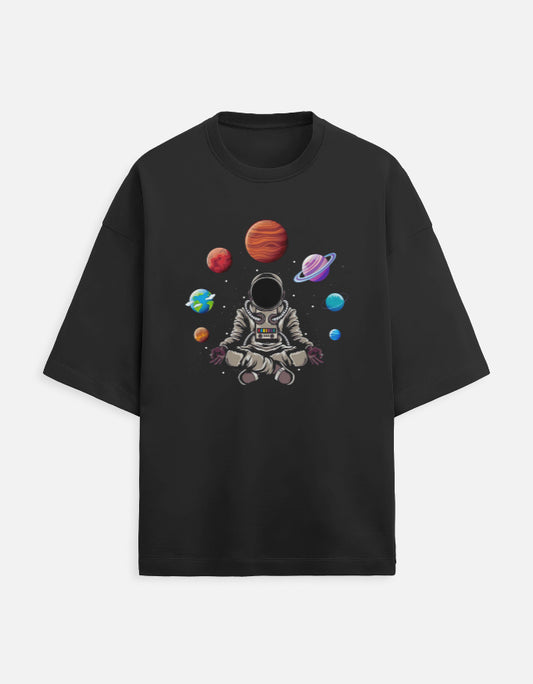 Black t-shirt with meditating astronaut and colorful planets space graphic