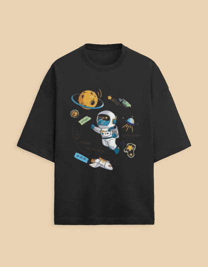 Black t-shirt with cartoon astronaut, planets, and space-themed graphic design