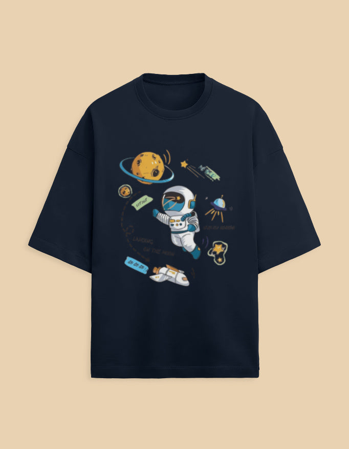 Black t-shirt with cartoon astronaut, planets, spaceship, and moon landing graphics