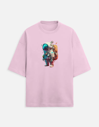 Pink oversized t-shirt with colorful cartoon astronaut graphic on front, white background