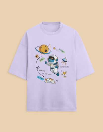Light purple t-shirt with space astronaut graphic, cartoon planets, and moon landing design
