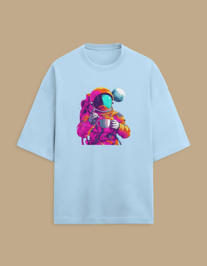 Light blue t-shirt with colorful astronaut holding a cup graphic, space-themed apparel