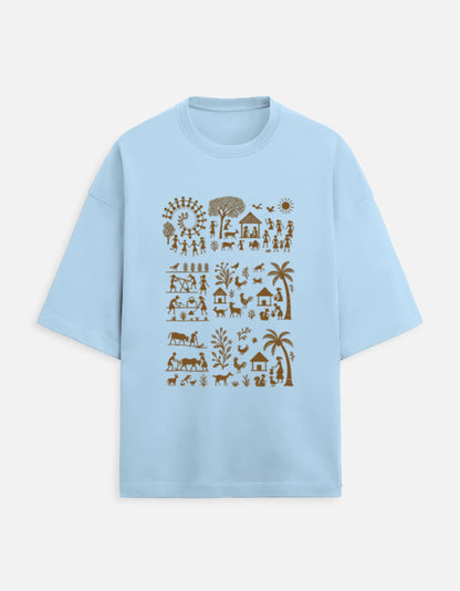 Light blue oversized unisex terry tee with gold village scene and brand logo