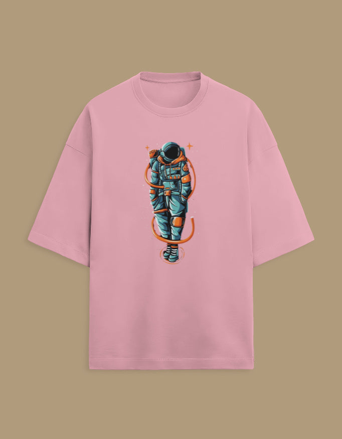 Pink t-shirt with colorful astronaut graphic, space-themed streetwear apparel
