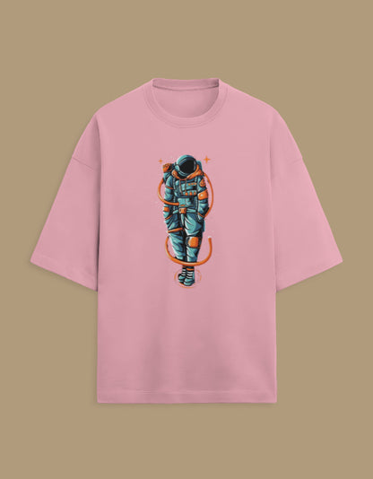 Pink t-shirt with colorful astronaut graphic, space-themed streetwear apparel