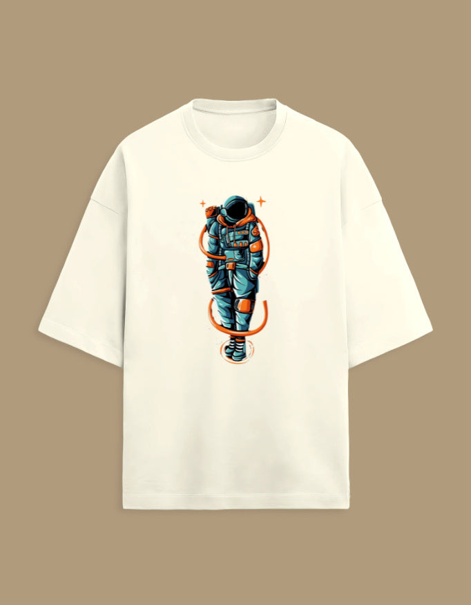 Beige t-shirt with colorful astronaut graphic, streetwear style on a brown background