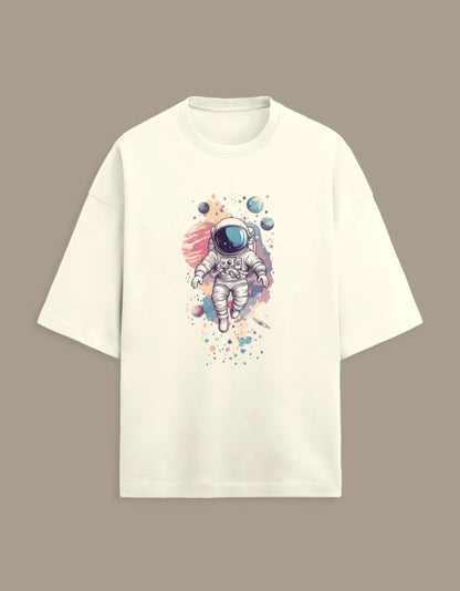 Beige t-shirt with colorful astronaut and planets graphic on front, space art clothing