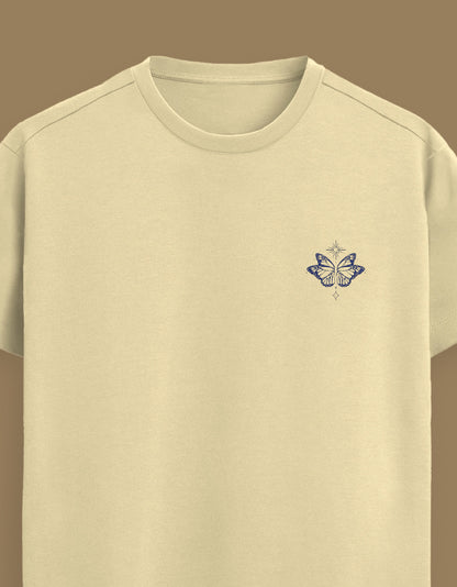 Color_Beige_Fabric: 100% Supima® cotton — 160 GSM. Ultra-soft, breathable, and made to last. 
Fit: Unisex regular fit 
Design: Minimal Butterfly embroidery on the left chest