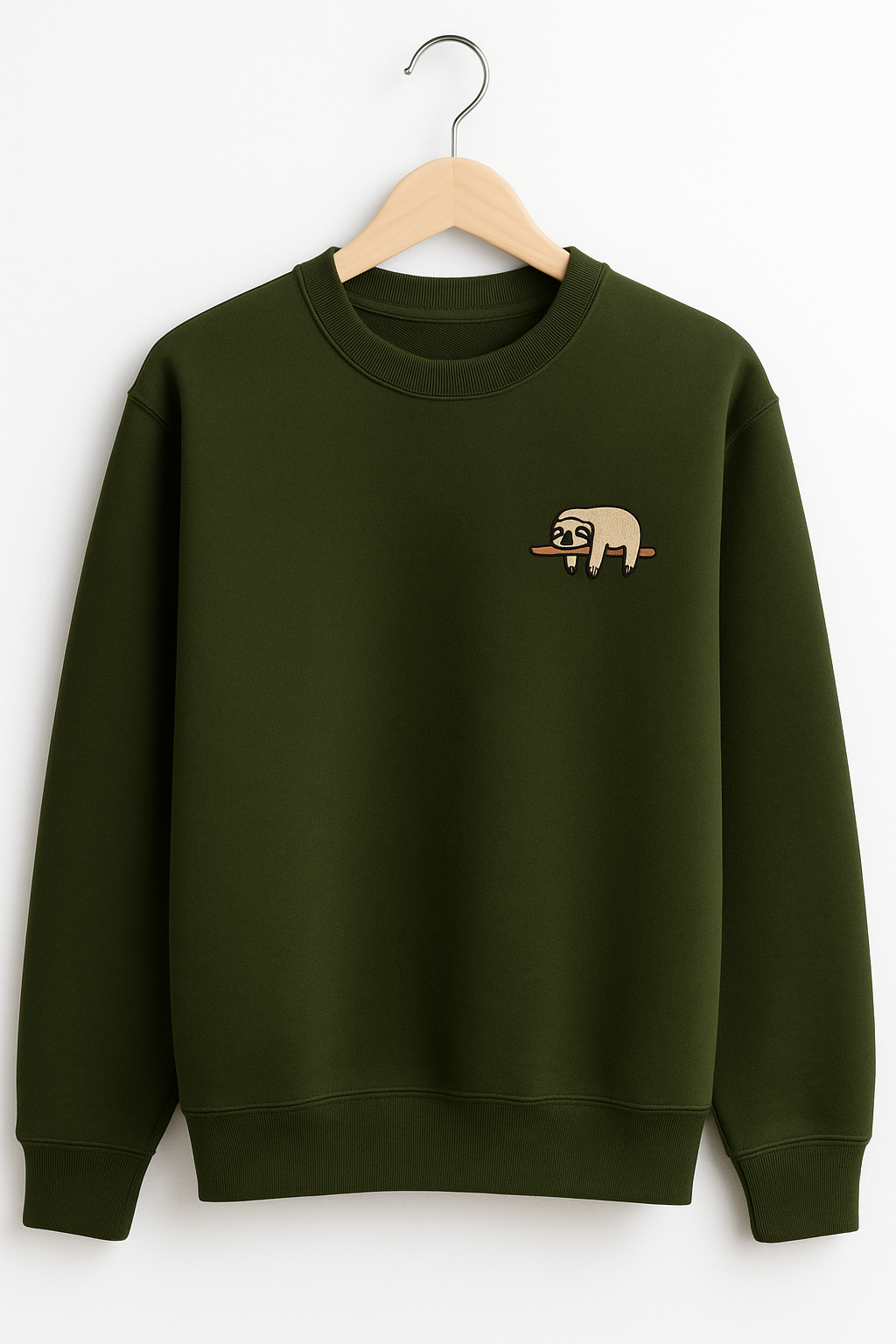 Green sweatshirt with a small bear design on a hanger against a white background